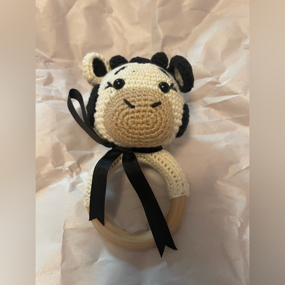 Crochet Cow Rattle Toy with Black and Cream Design